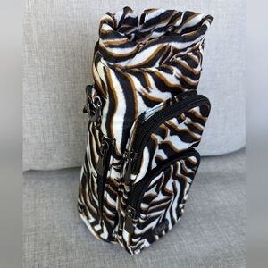 Lug Huggie Wide Convertible Crossbody/Belt Bottle Bag in Zebra Sand